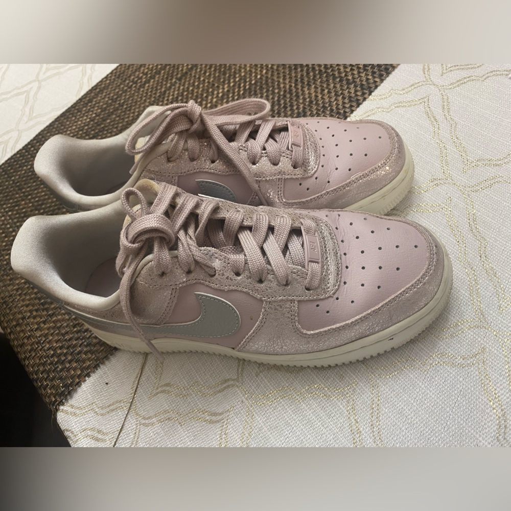 Nike Women’s Dusty Pink Low-Top Sneakers with Silver Swoosh